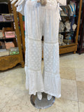 White ruffle top and tiered pants set